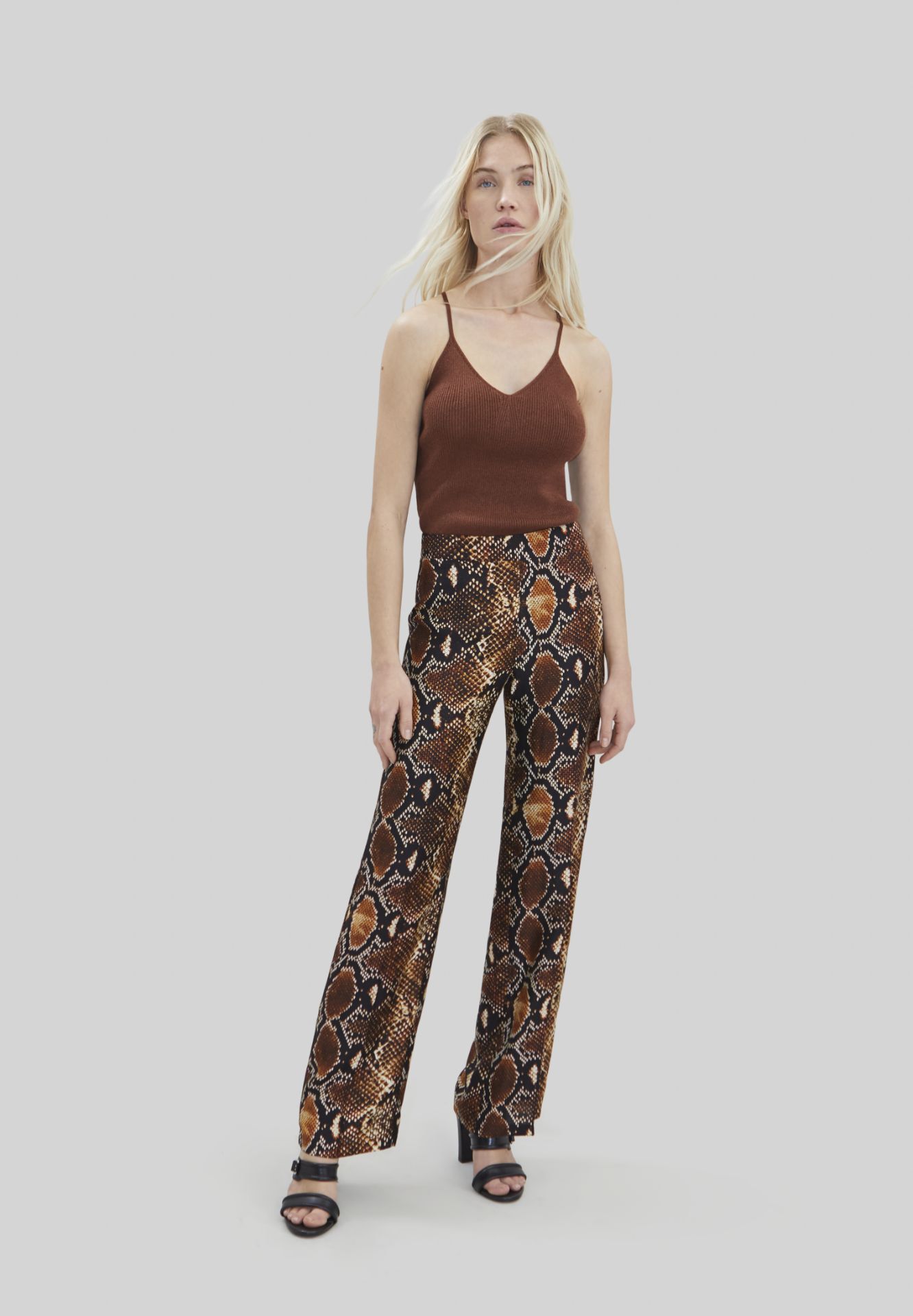 Pure Edition–Women’s mahogany rock python trousers