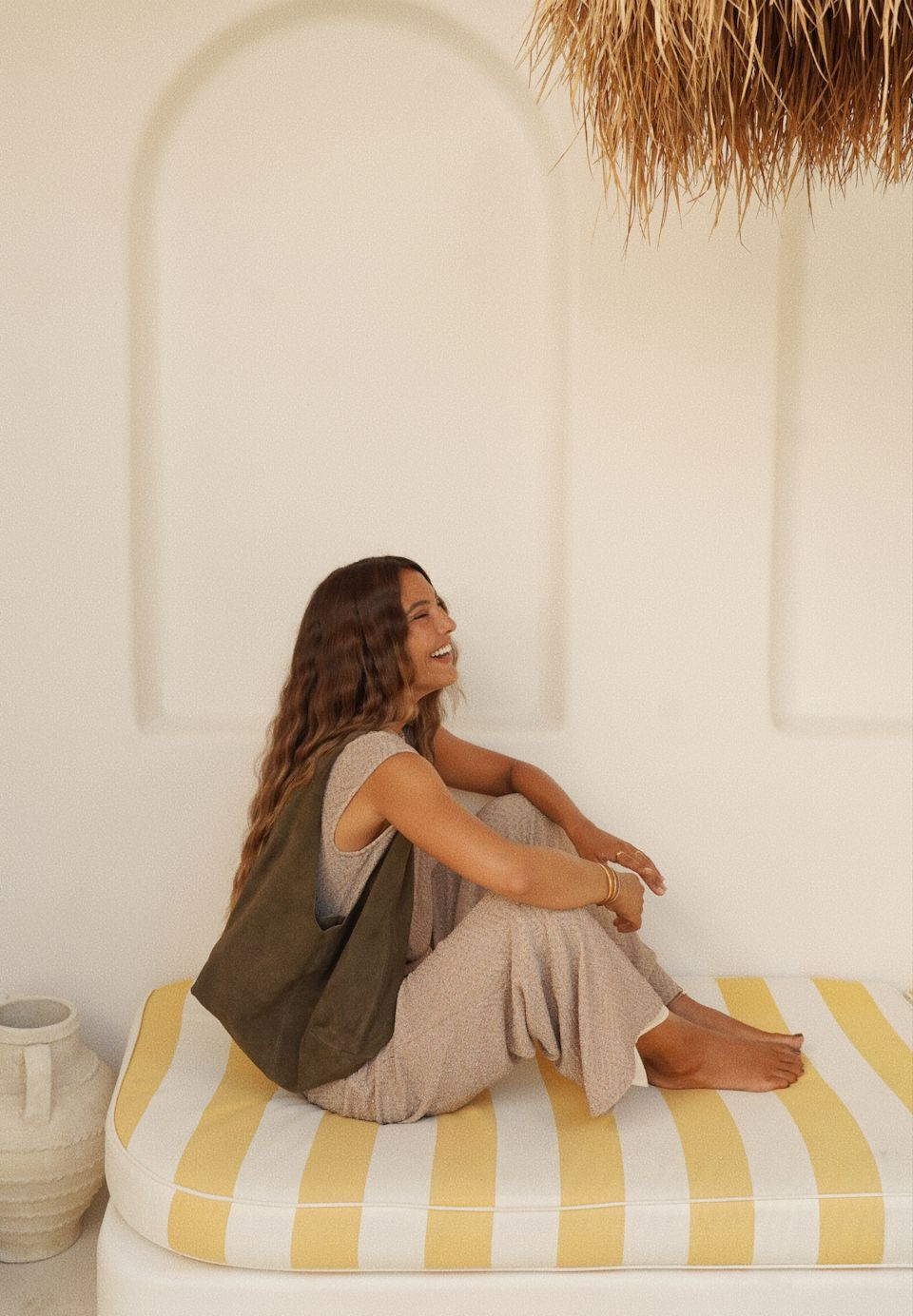 Dames jumpsuit met visgraatmotief in goud