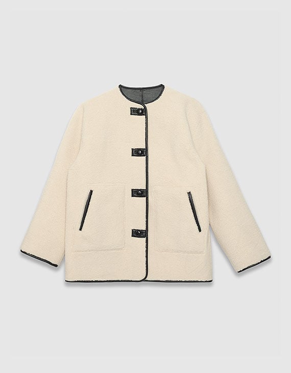 Omkeerbare jas ecru sherpa en zwart Dames