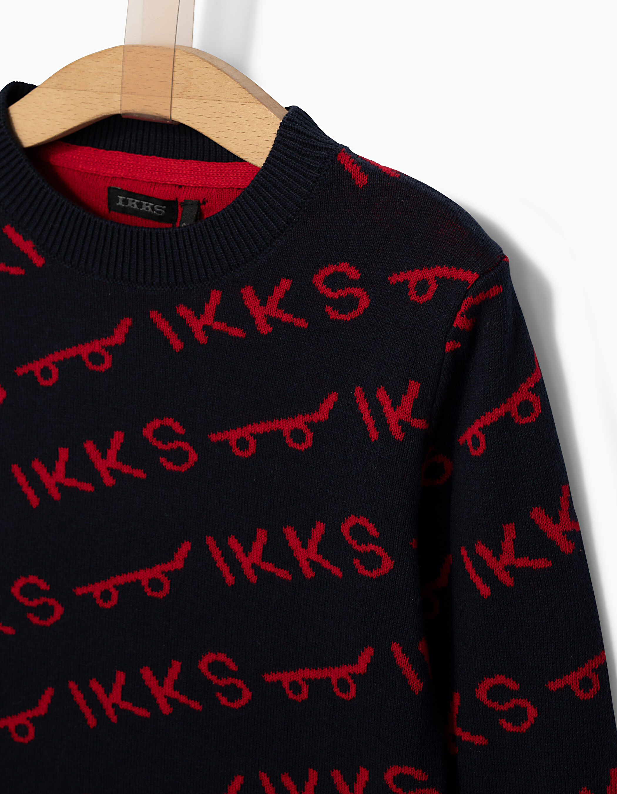 Boys navy sweater with red skateboards