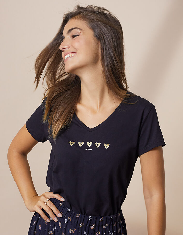 Camiseta negra con mensaje y corazones oro I.Code - I.CODE