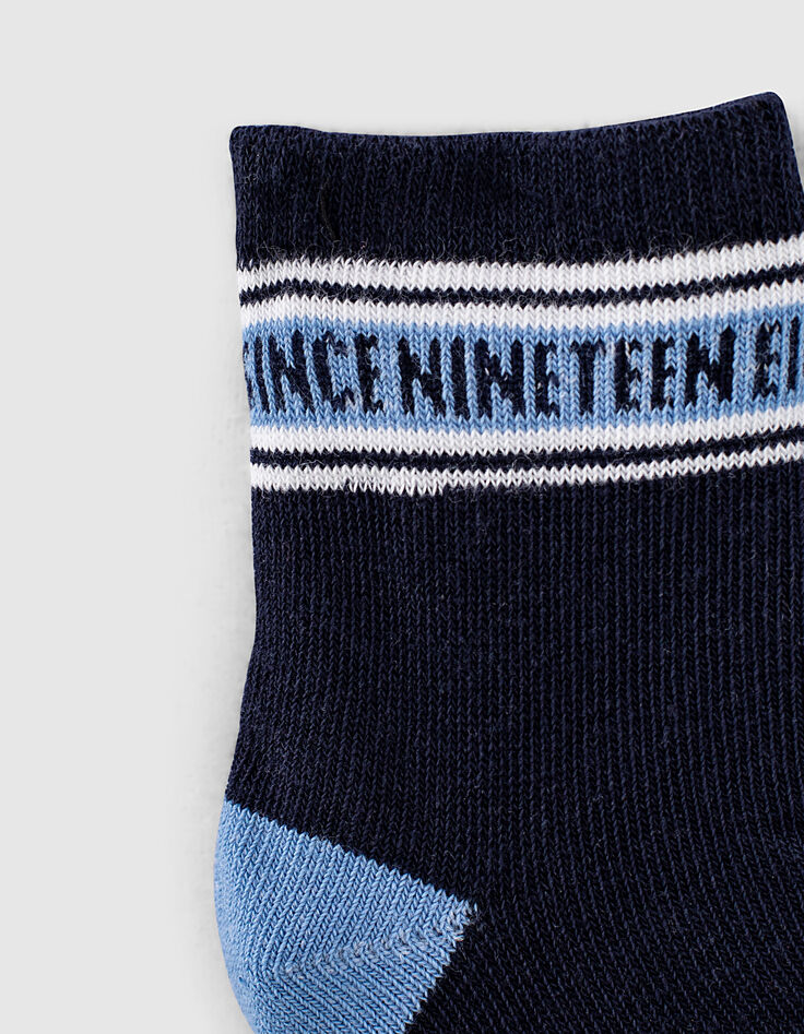 Marineblaue, weiß gestreifte und orangefarbene Socken -2