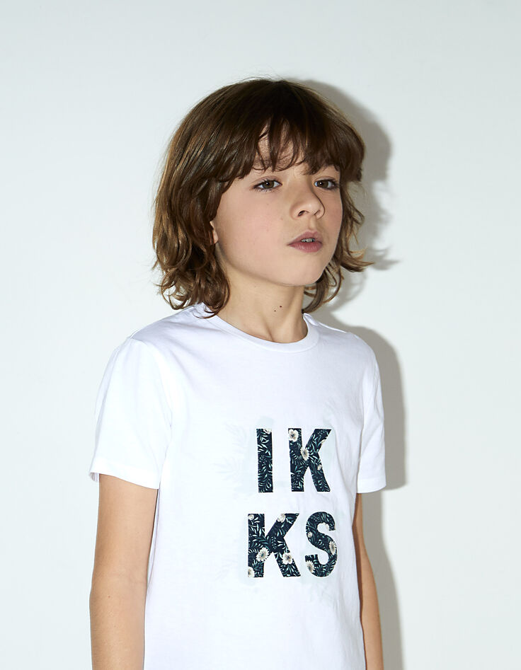 Camiseta blanco roto logo floral niño -1