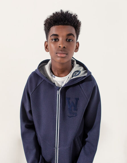 Boys’ navy cardigan with all-over print inside