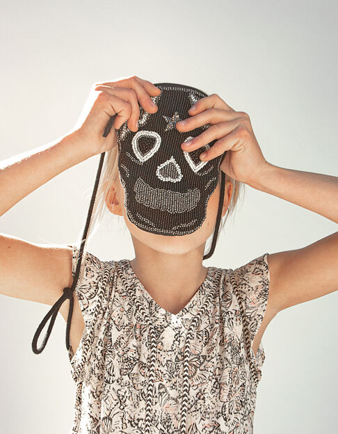 Girls’ black embroidered skull bag.