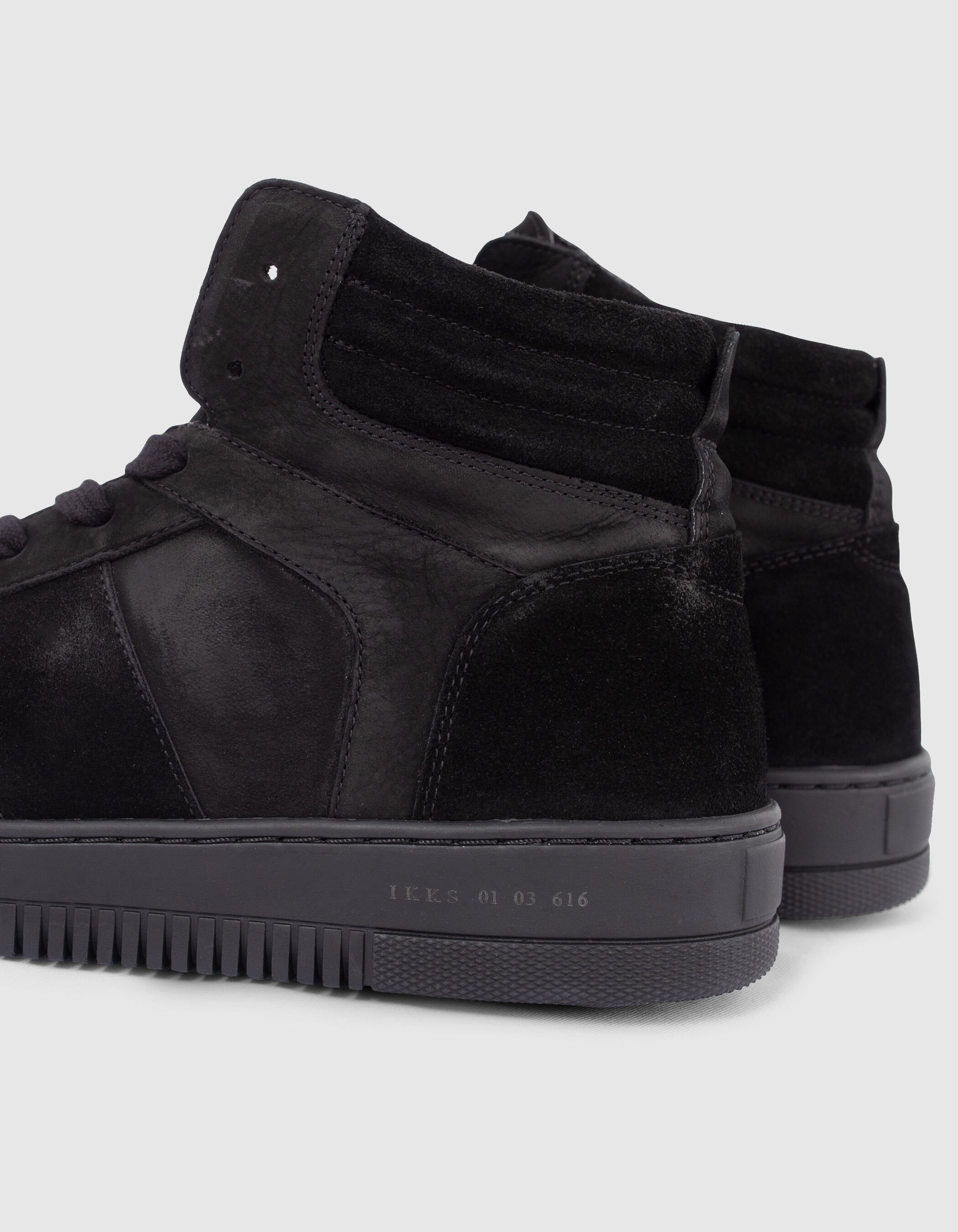 Sneakers noires montantes en cuir et cuir velours Homme