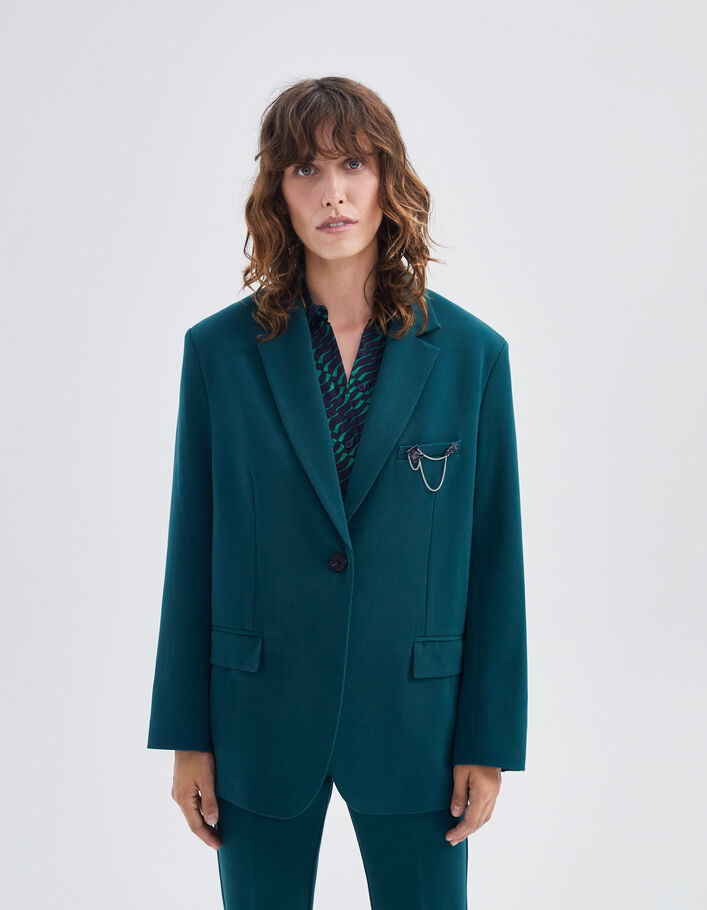 Women's duck green suit jacket with pin badge