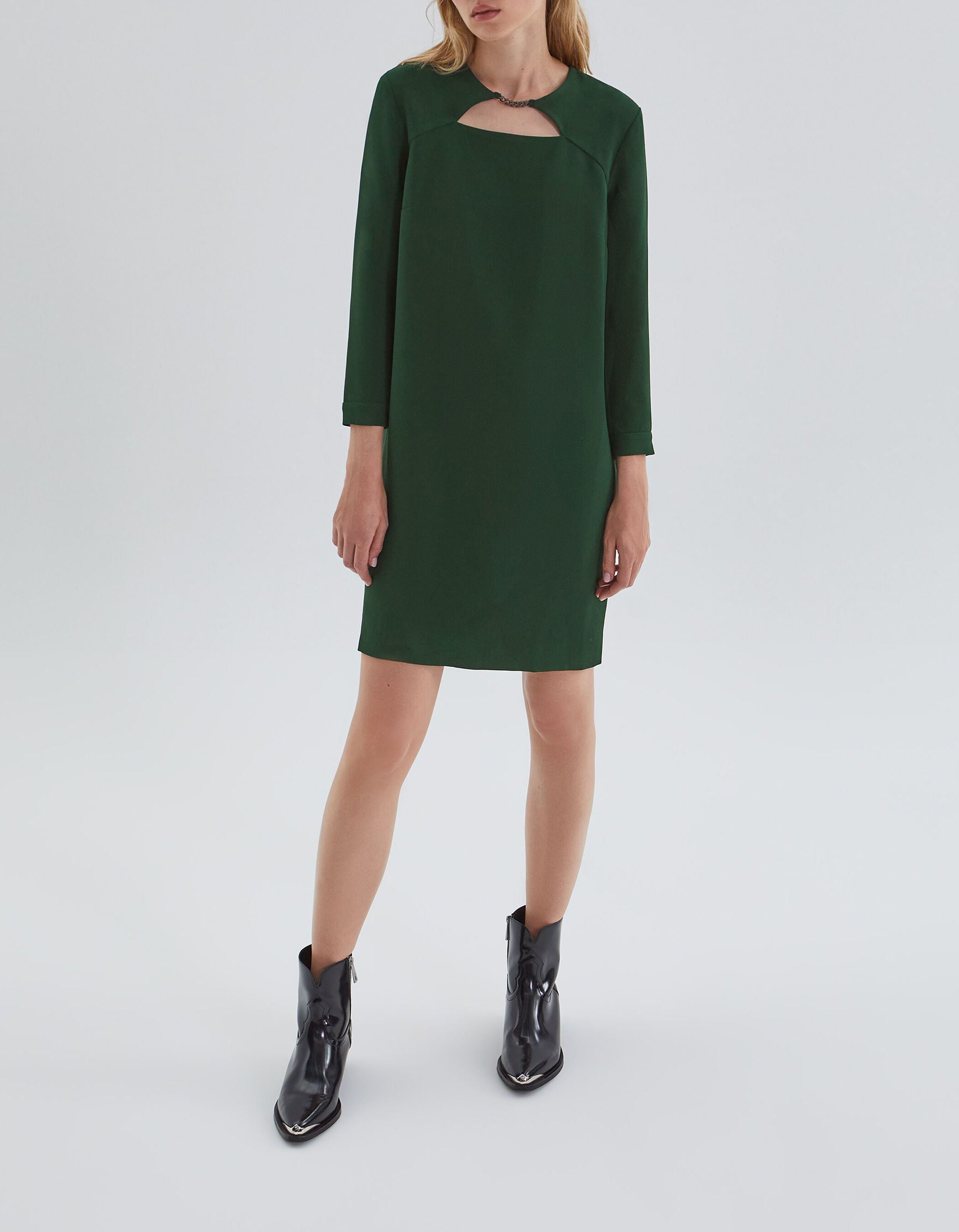 Women s green dress with metal chain on front