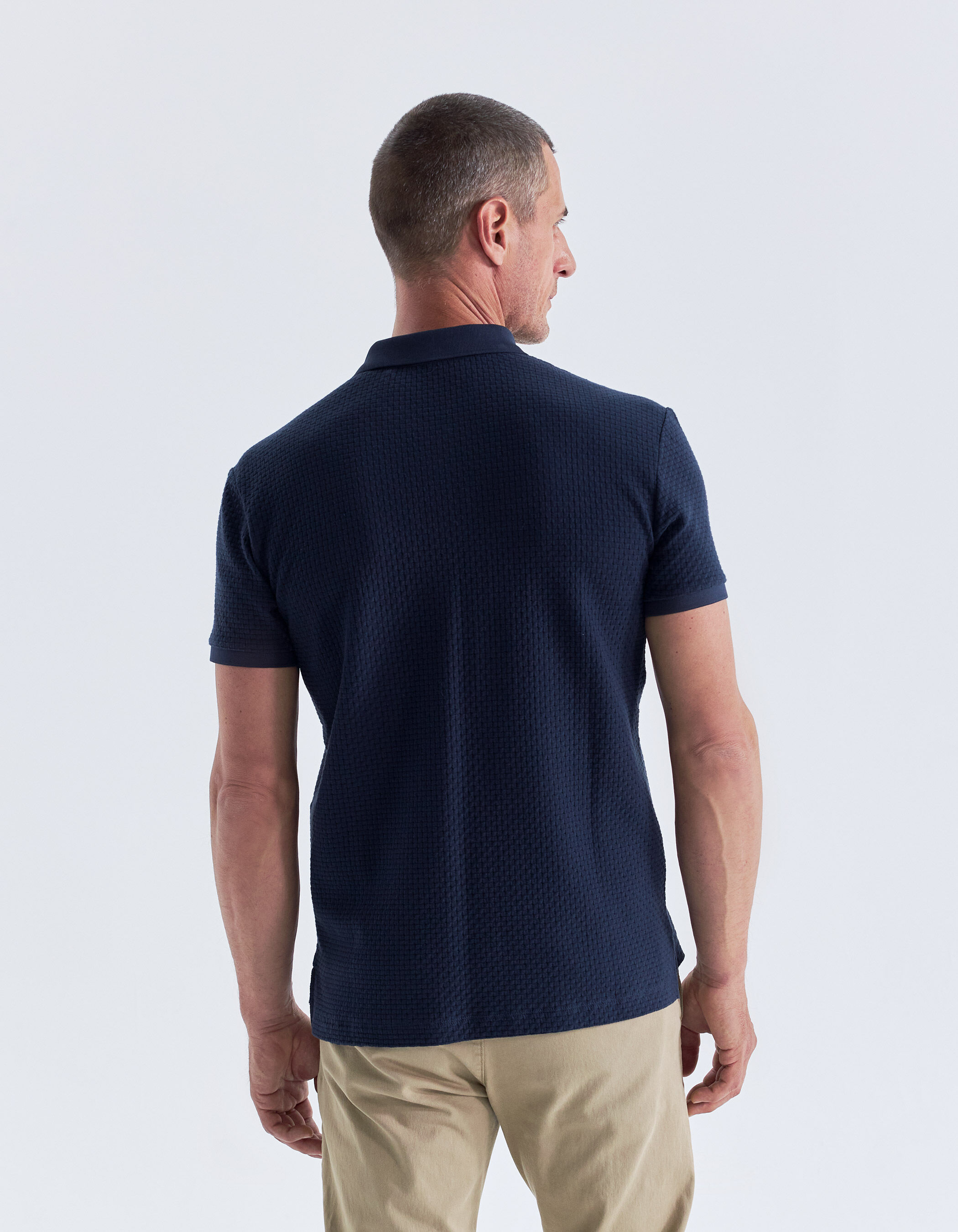 Men s navy polo shirt with woven look texture