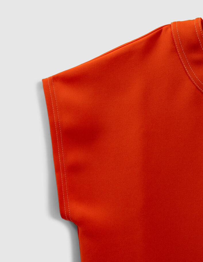 Women's tangerine top edged with double topstitching