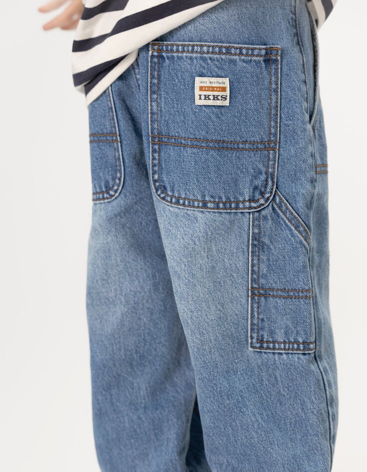 Blaue Jungen-Baggy-Jungenjeans mit Zimmermannstasche-4 Blaue Jungen-Baggy-Jungenjeans mit Zimmermannstasche-4