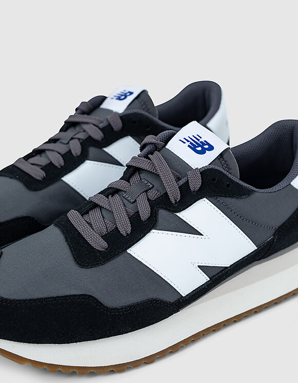 mens all black new balance trainers