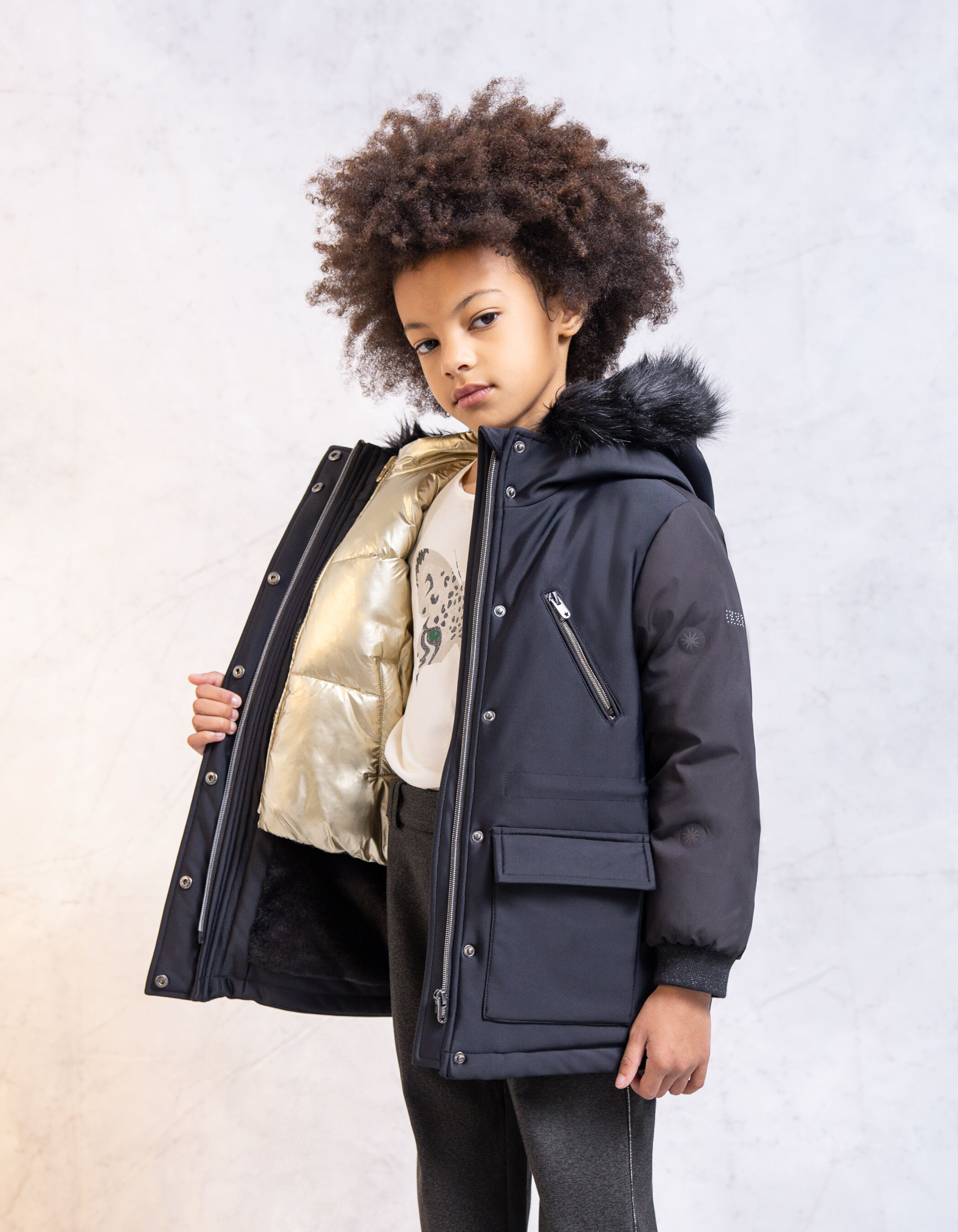 Parka 2 en 1 noire avec doudoune doree sans manches fille IKKS