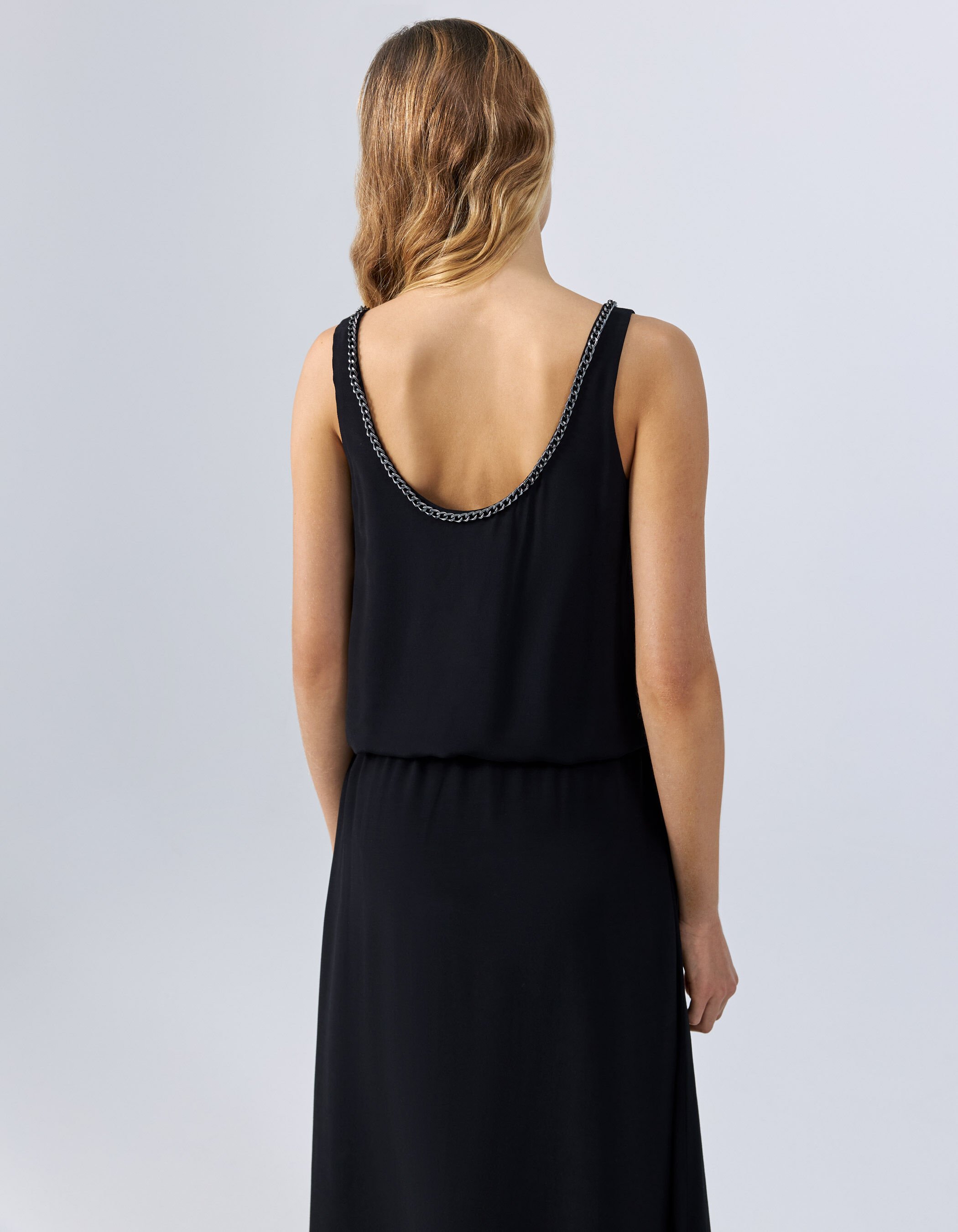 Zwarte jurk shop zonder mouwen