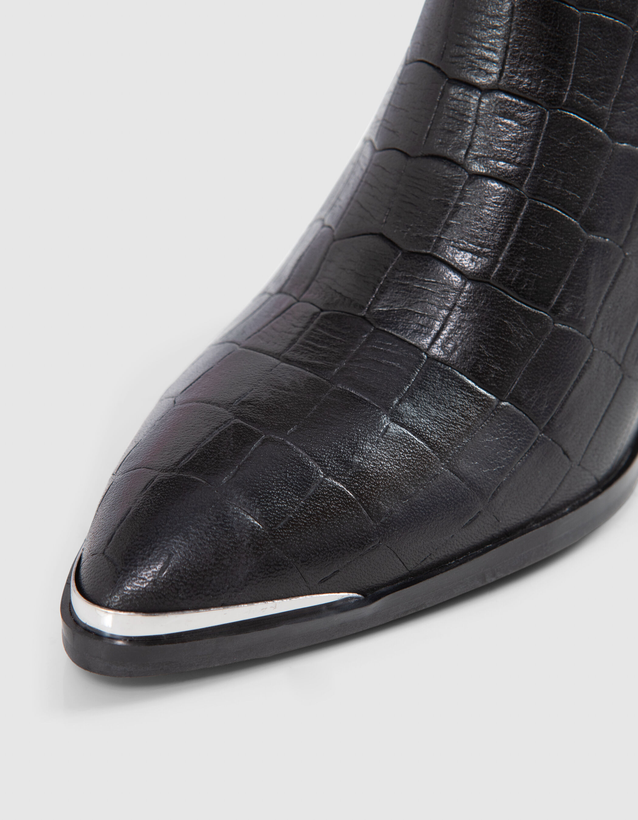 Women s black embossed leather low boots with metal clip IKKS