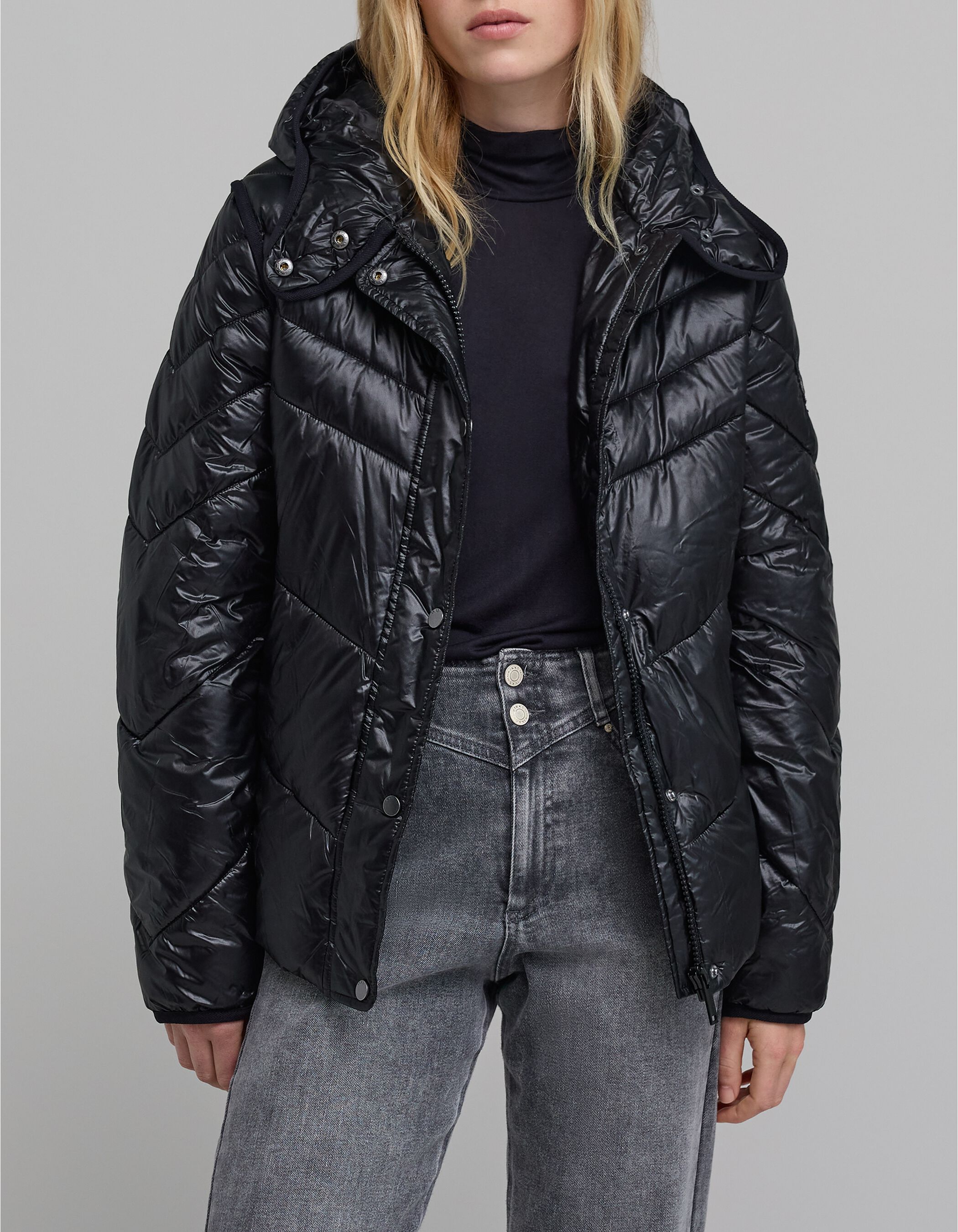Women's black short padded jacket with metallic lining
