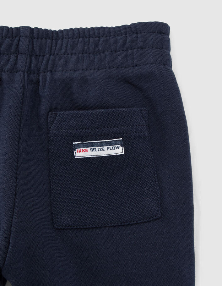 Baby boys' navy knit trousers with seamed pockets