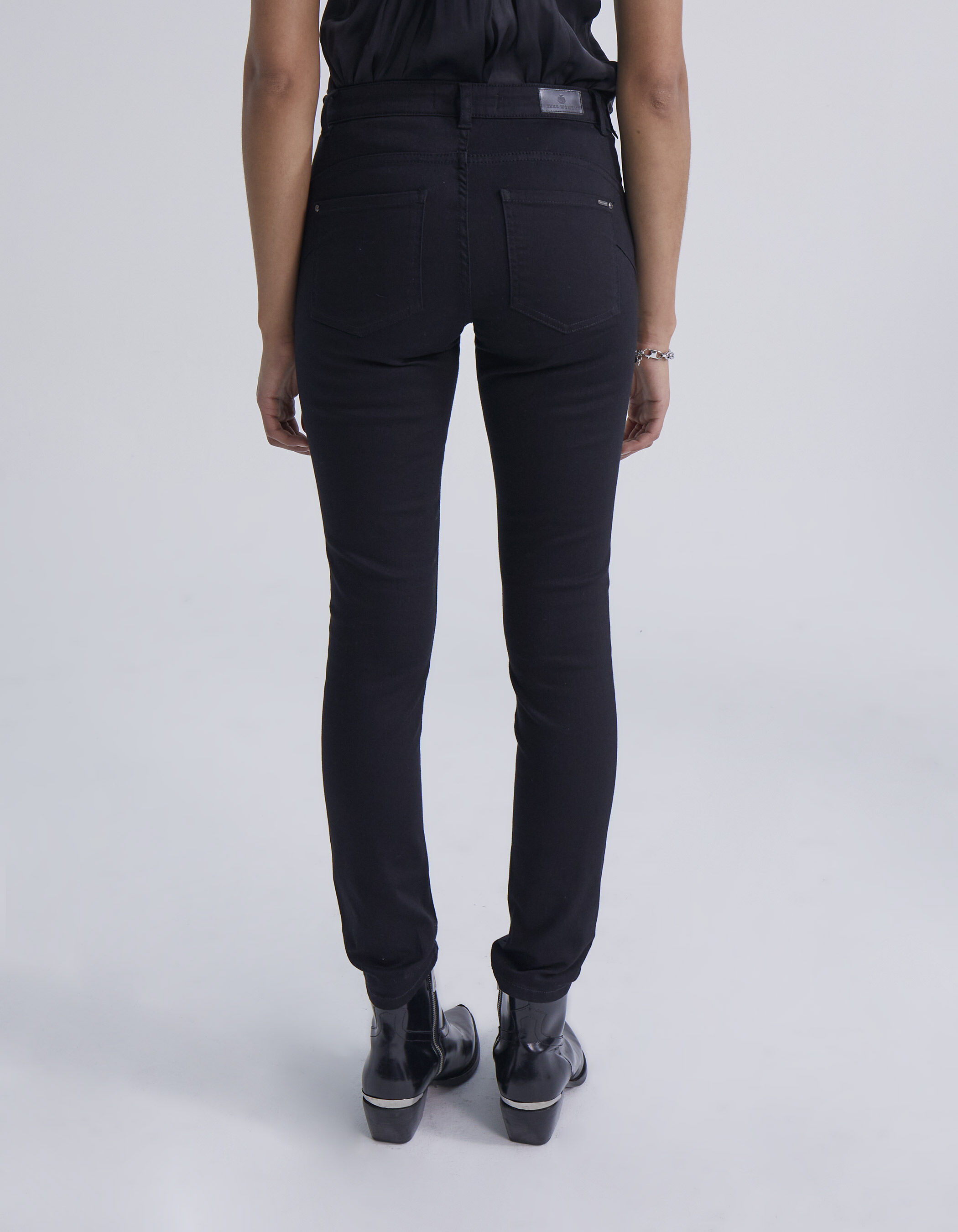 Jean noir avec poche sur le coté hot sale femme