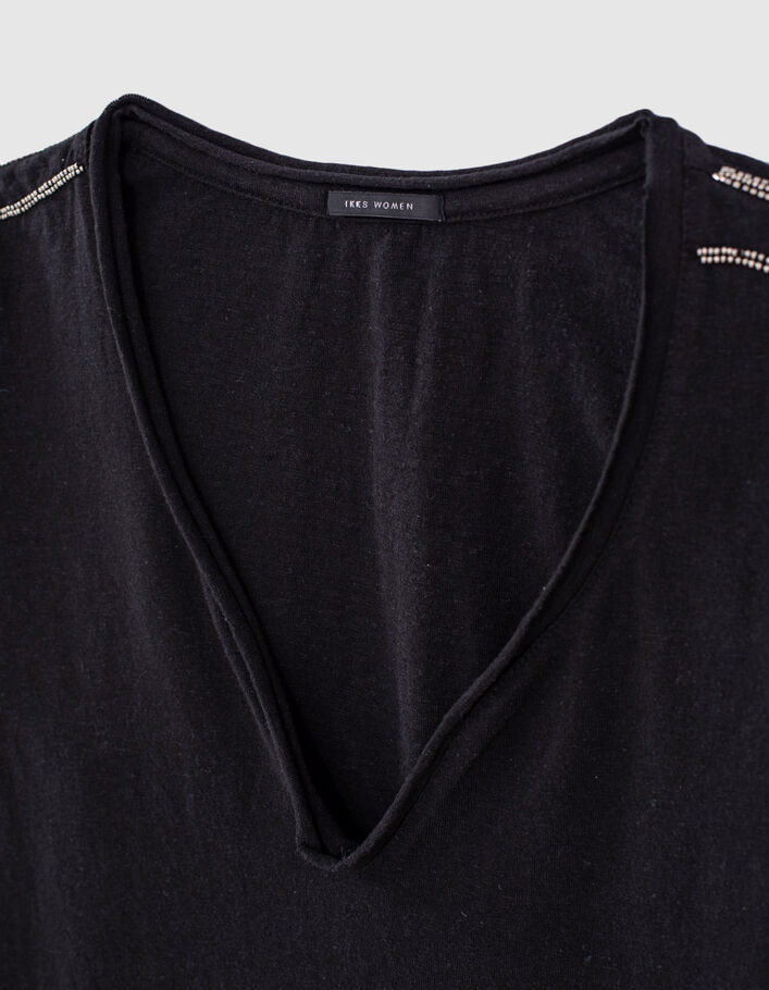 Camiseta negra manga larga insignia mujer - IKKS