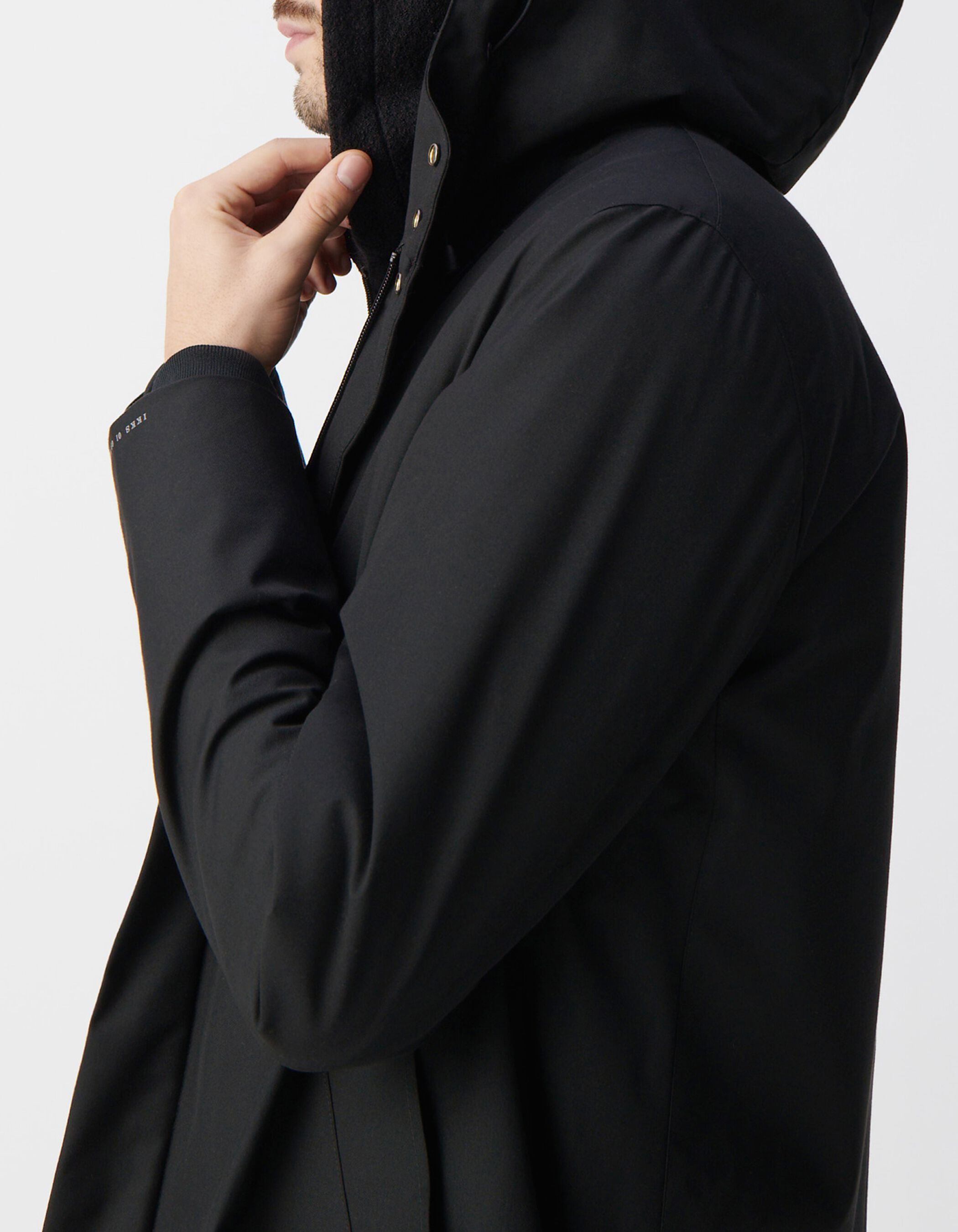 Parka negra de hombre con ribetes desmontables