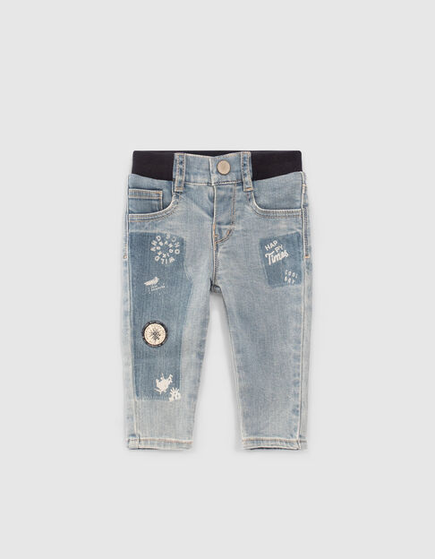 Baby boys’ blue jeans with print and badge
