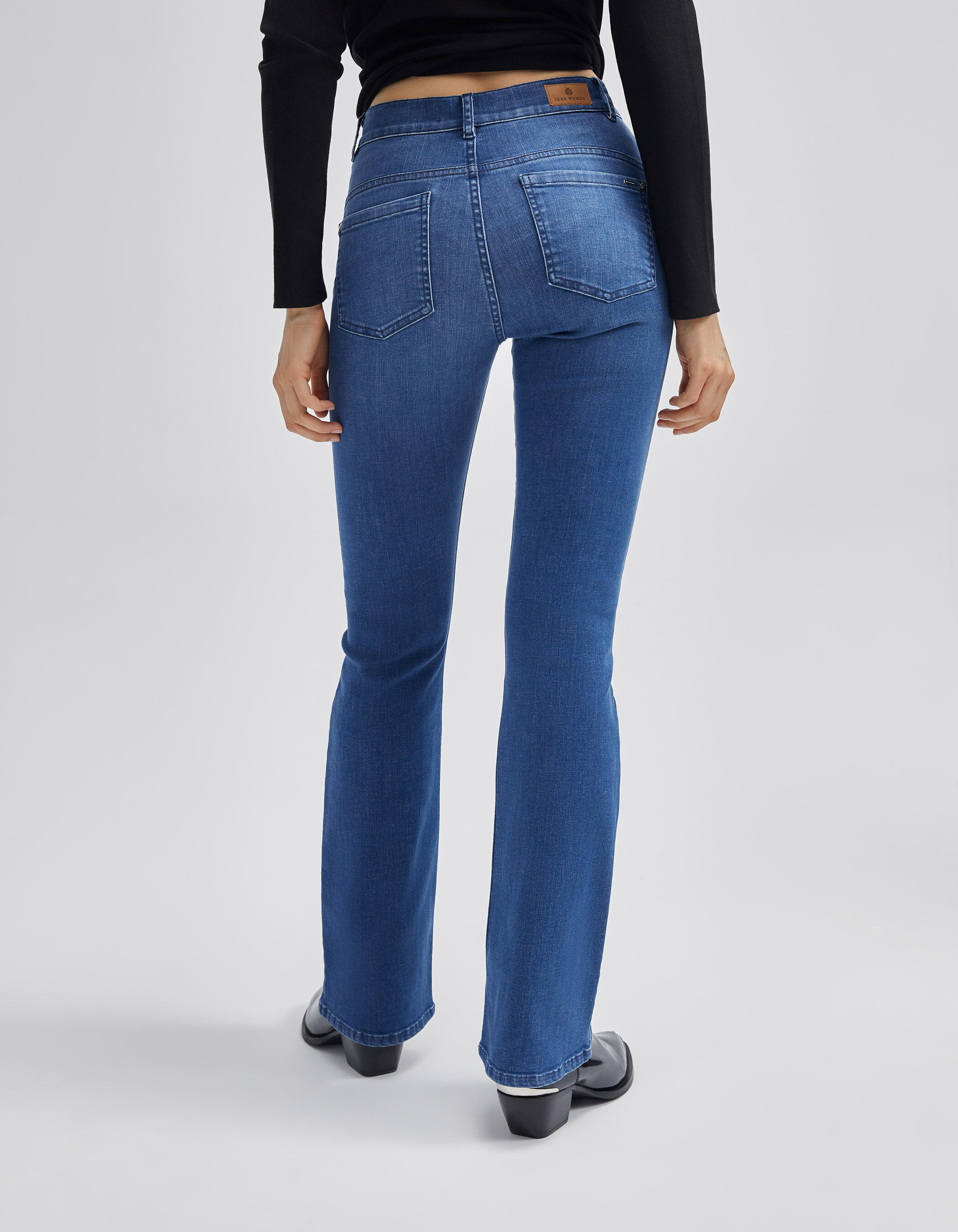 Jean flare bleu taille haute effet sculpt up Femme