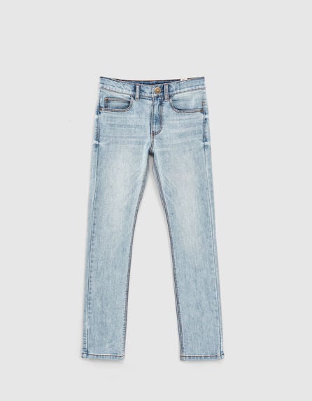 Boys’ faded blue skinny jeans with placed worn patches