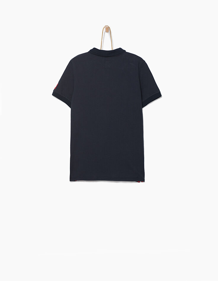 Polo navy con banda gris, blanco, rojo niño -4