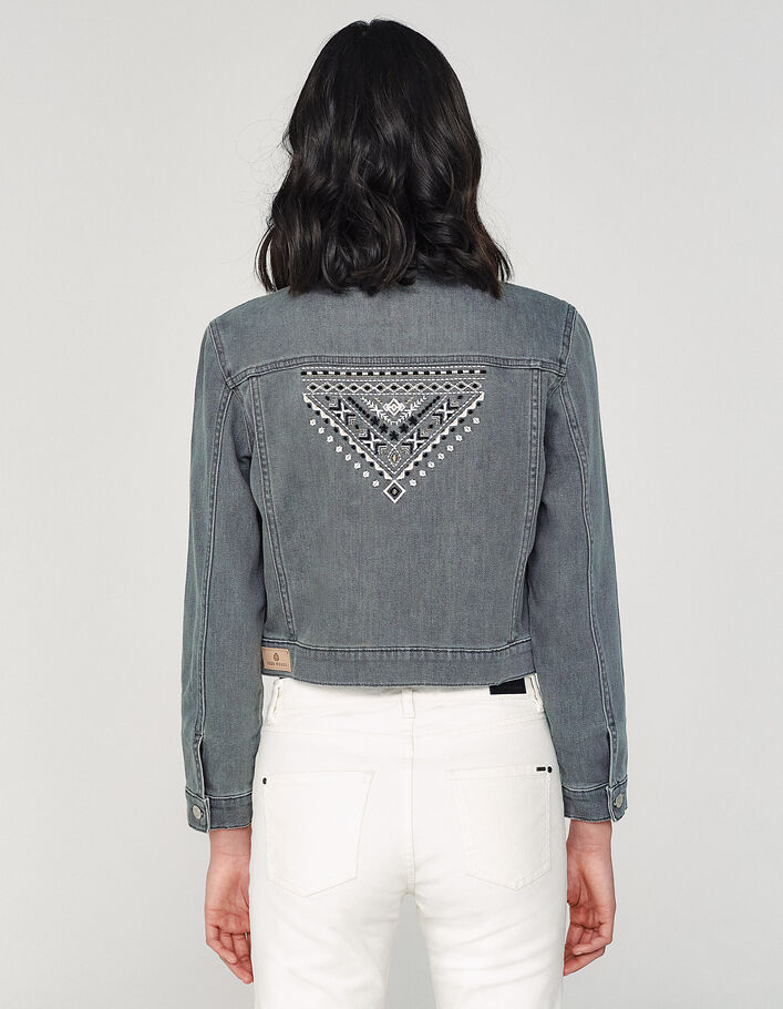Women’s grey denim jacket embroidered on back