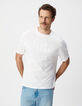 Herren T-Shirt aus wei&szlig;em Samt mit GEFLOCKTER Botschaft-2
