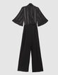 Women’s black mixed-fabric jumpsuit with flowing top-6
