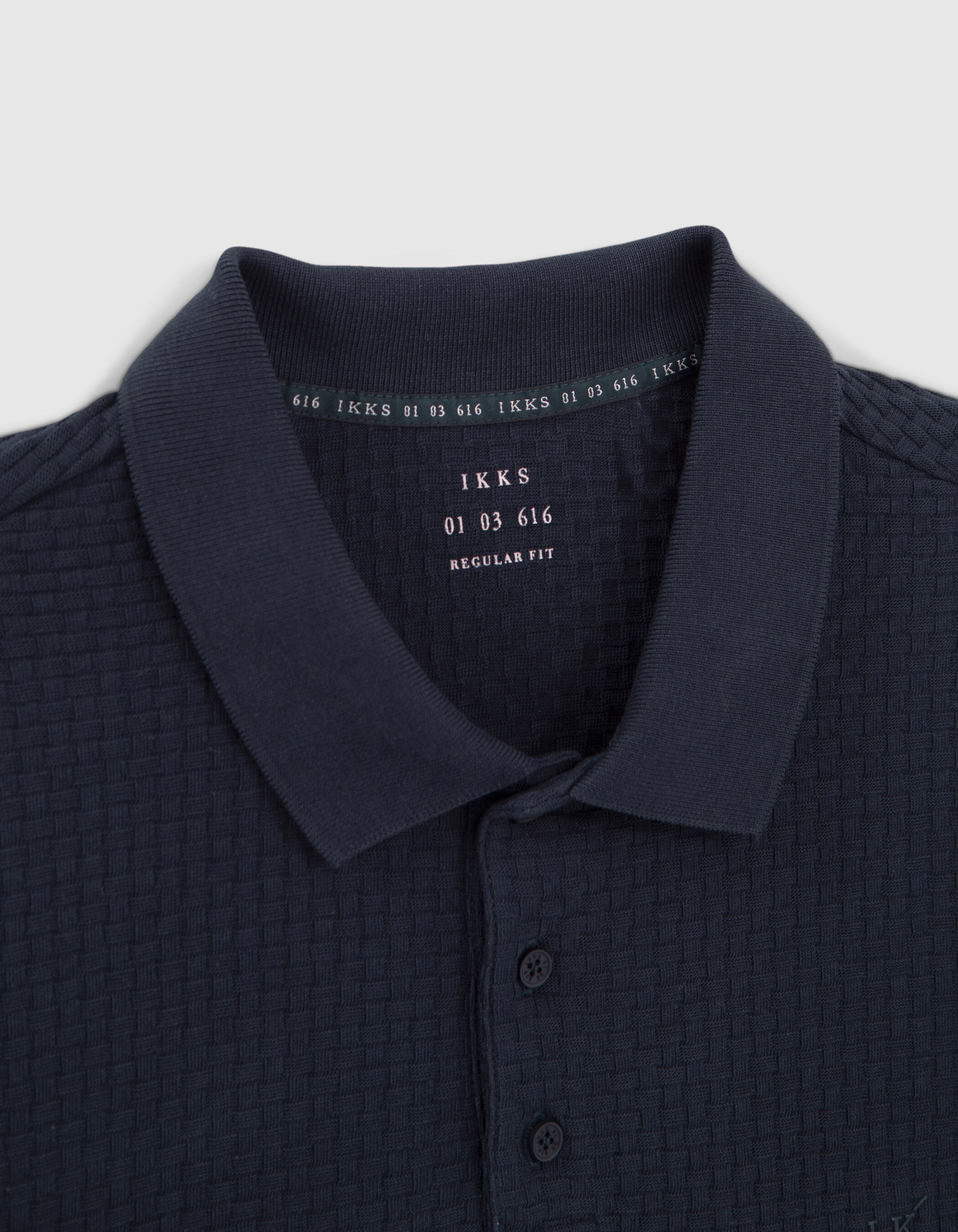Men s navy polo shirt with woven look texture