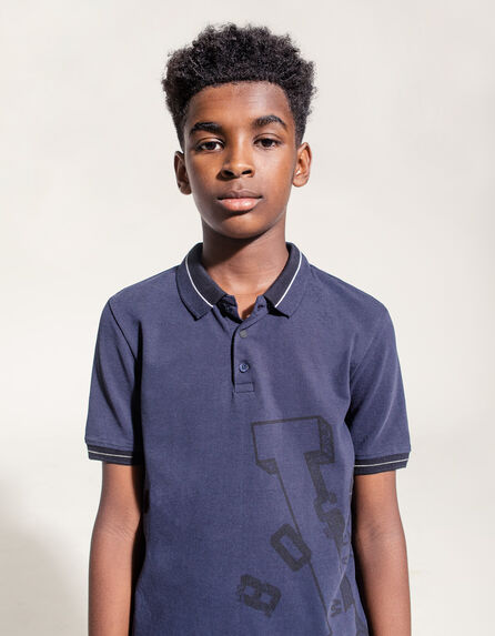 Boys’ navy polo shirt with black side marking 