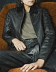 Women’s black quilted leather jacket with sheepskin collar-6