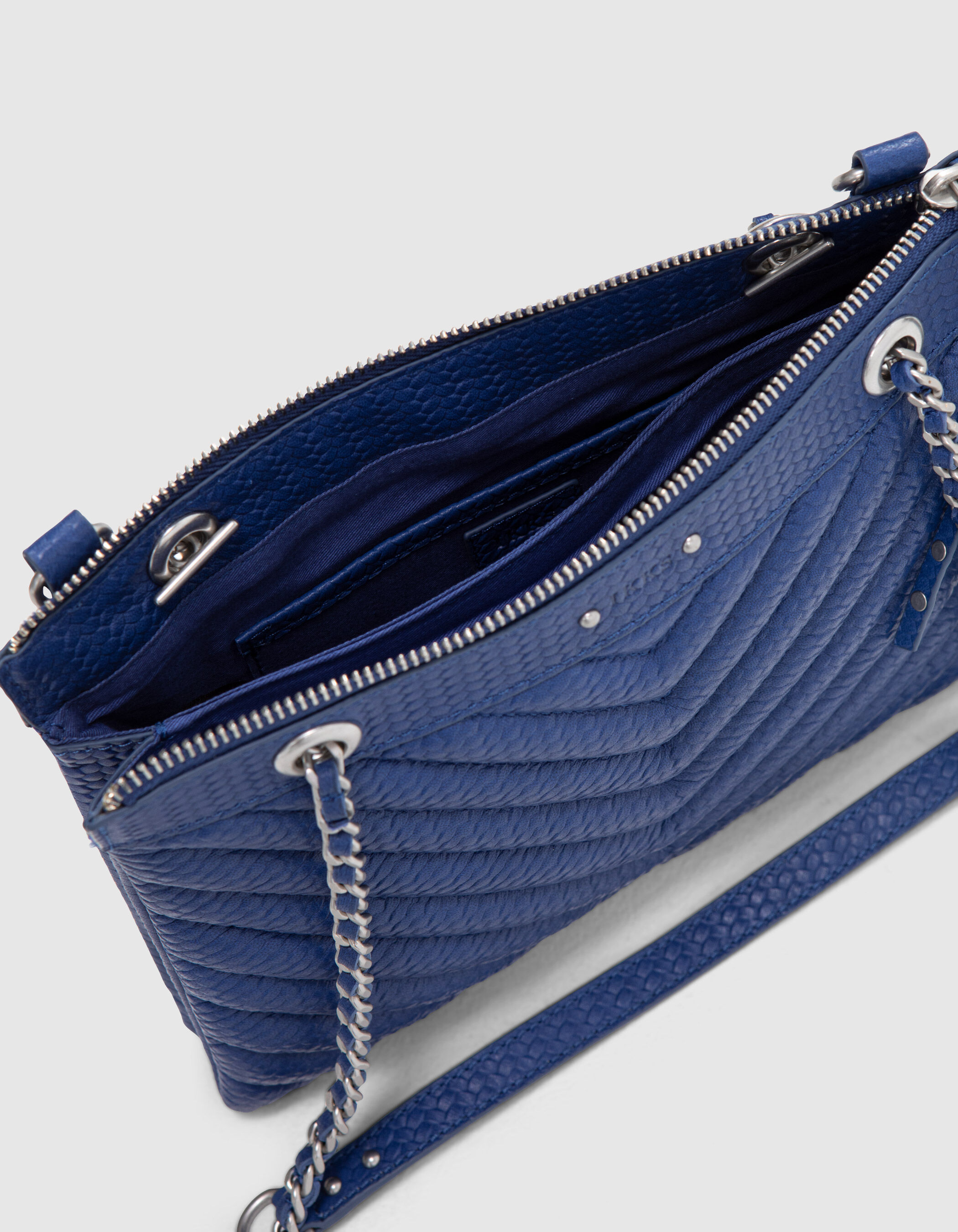 Women s cobalt embossed leather 1440 Reporter clutch bag IKKS