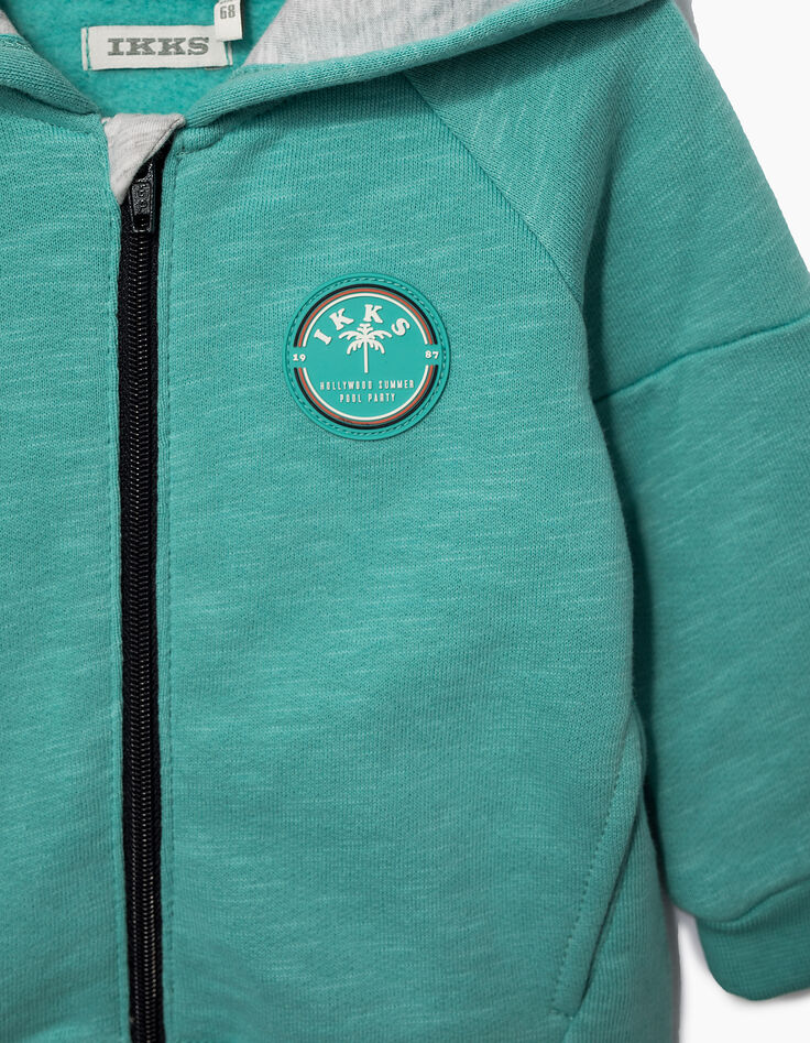 Türkisgrüne Baby-Strickjacke mit Palmen hinten -3
