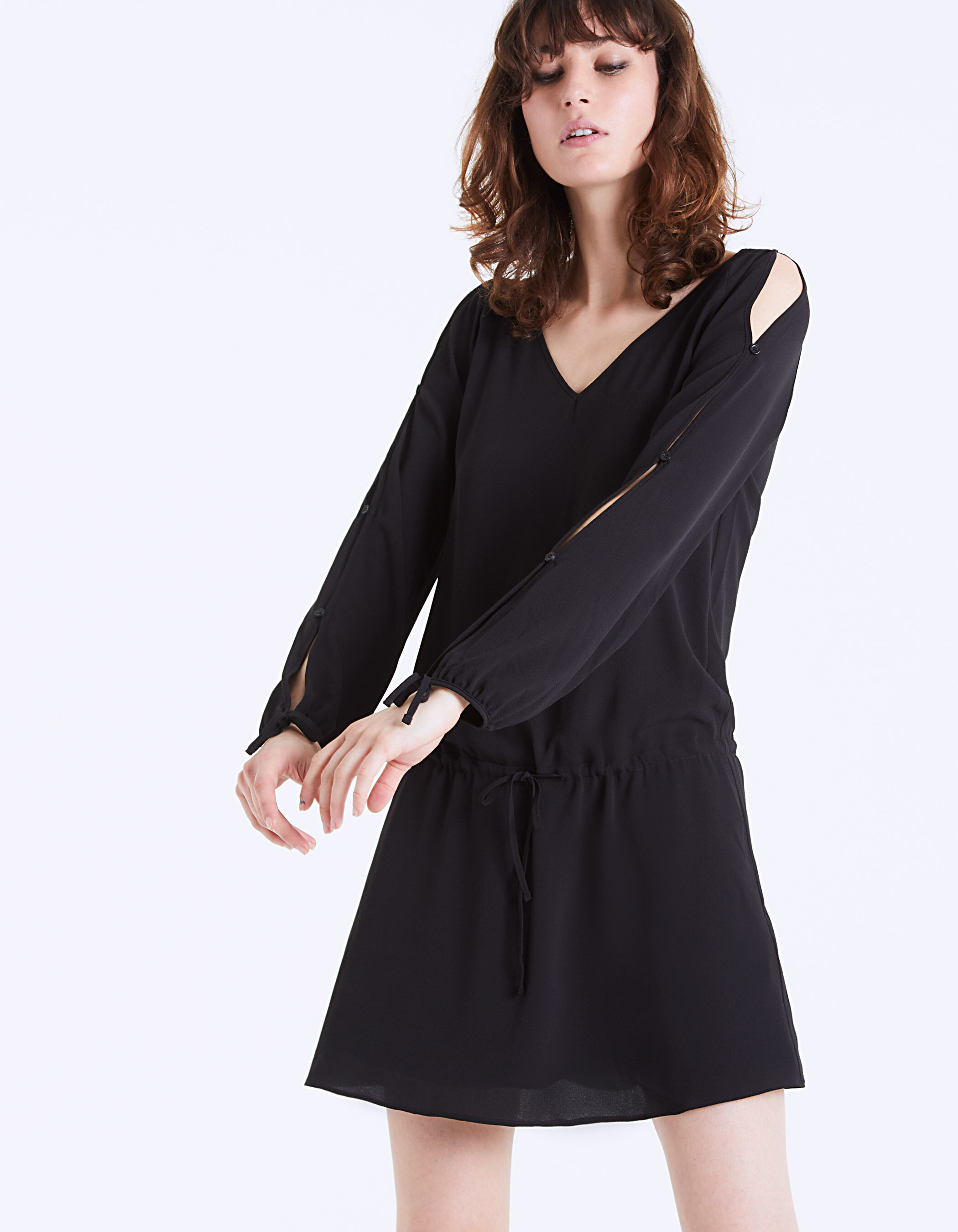 Long sleeved black cr pe dress