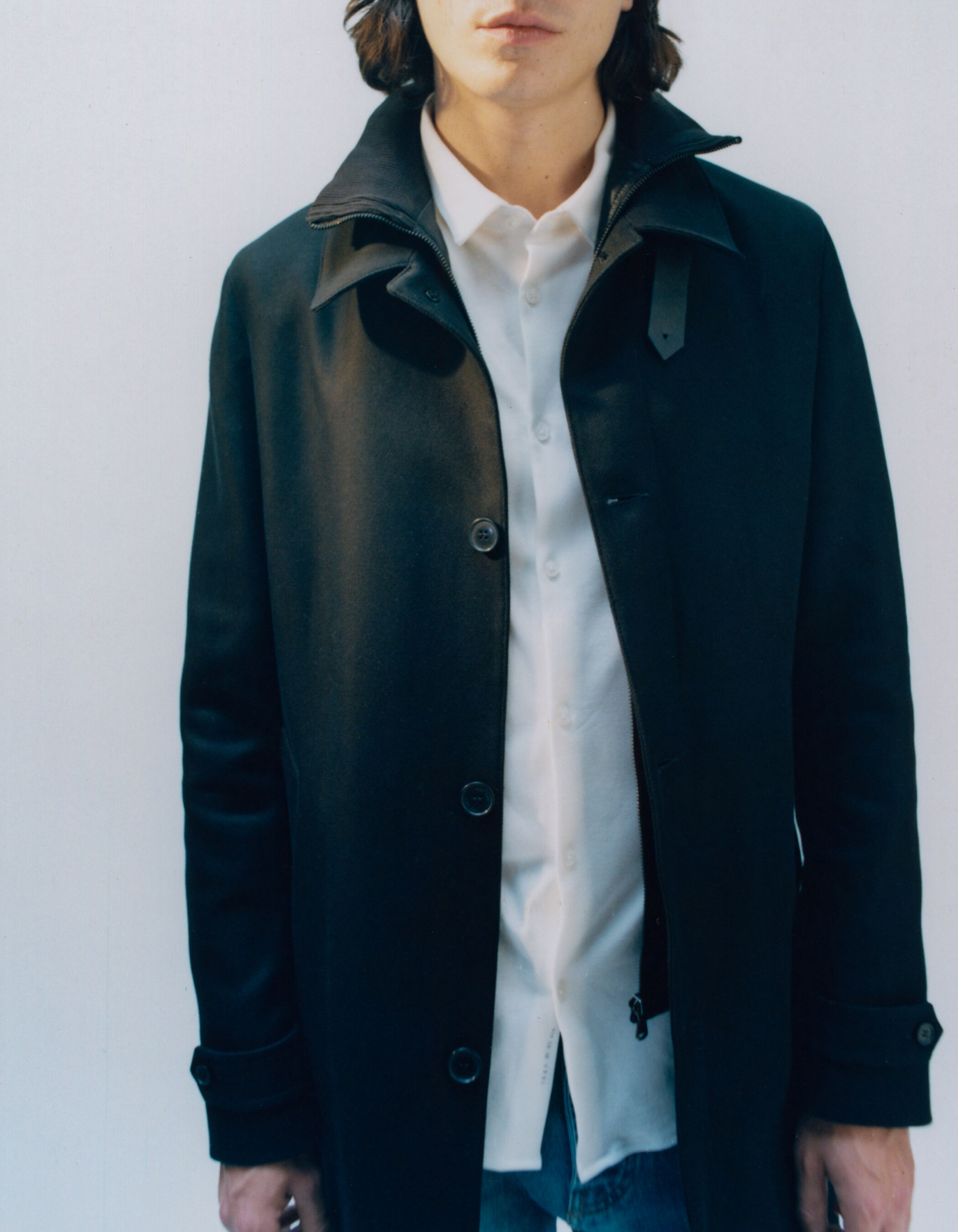 Men's black trench coat with detachable hood facing IKKS