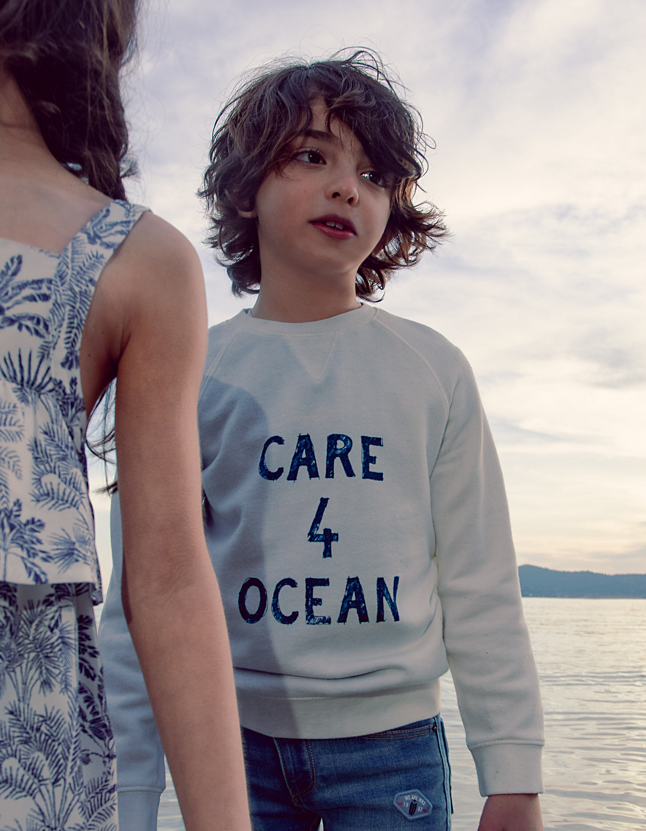 White sales slogan sweatshirt