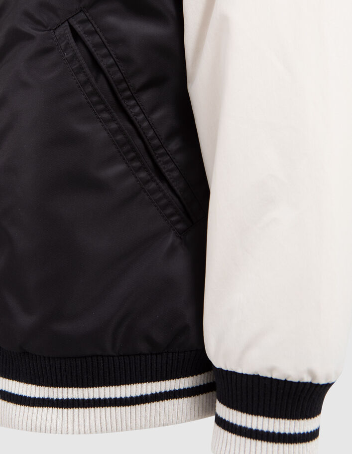 Boys’ black Varsity jacket, ecru sleeves, embroidered back