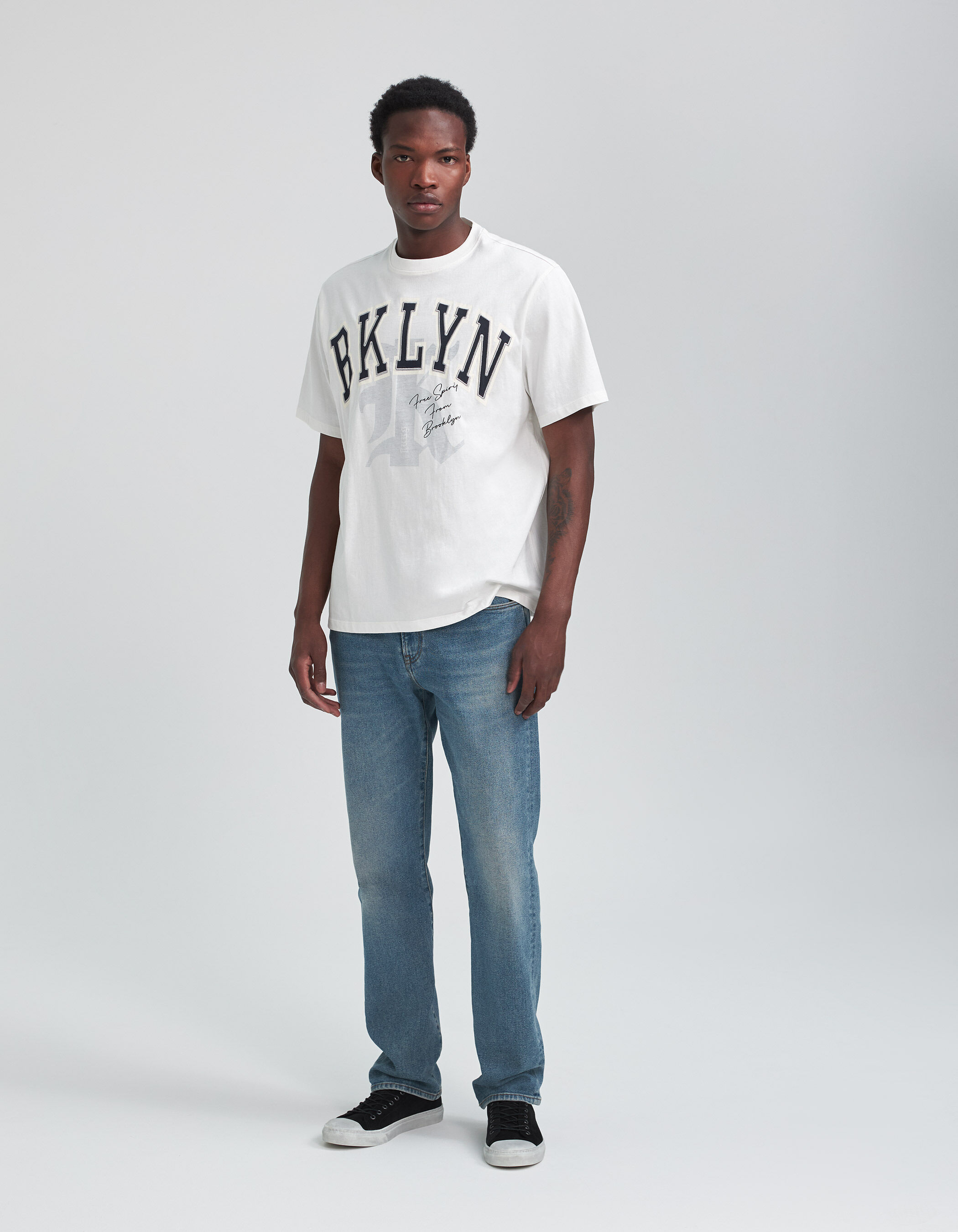 Men s white organic t shirt with XL College style letters