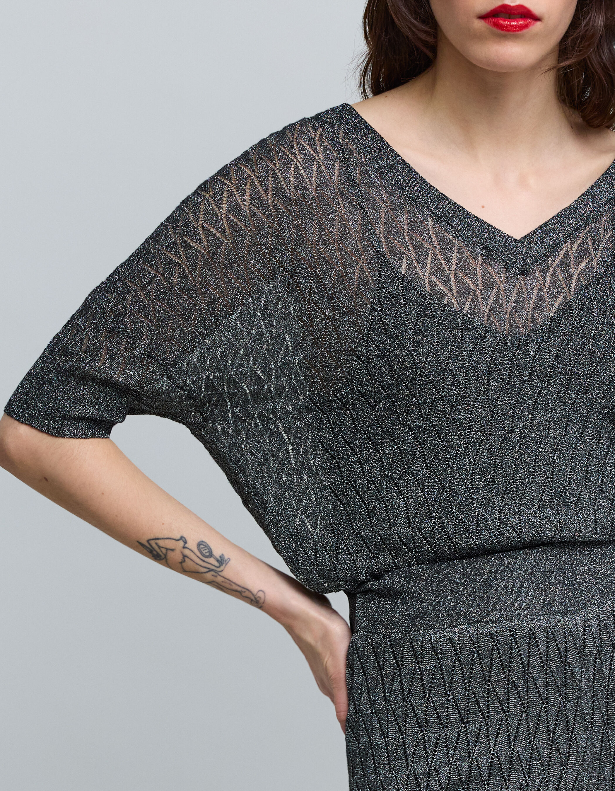 Women's grey fine knit openwork graphic sweater