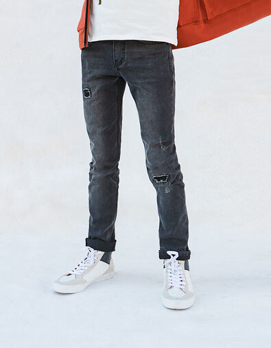Boys’ worn-out black slim jeans with repaired holes - IKKS