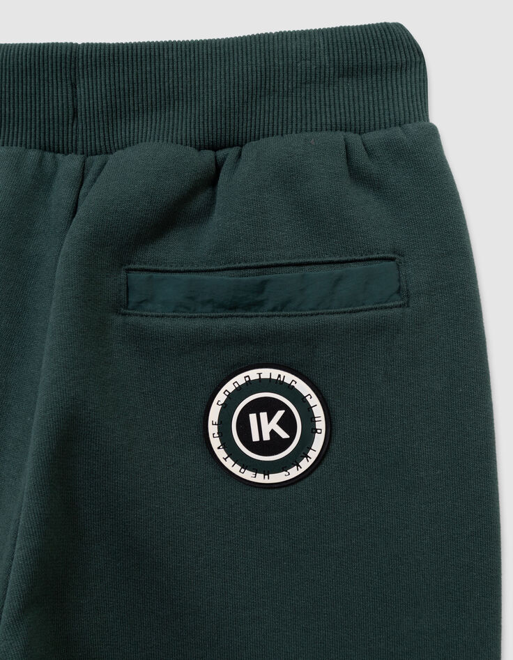 Jogging verde bolsillo bimaterial niño-9