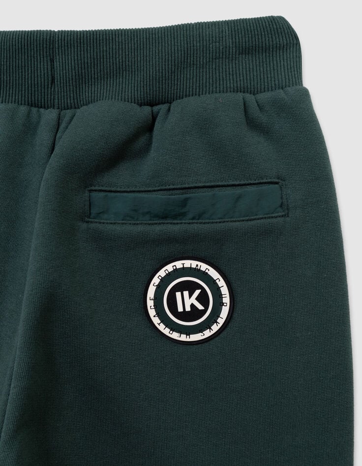 Jogging verde bolsillo bimaterial niño-9 Jogging verde bolsillo bimaterial niño-9