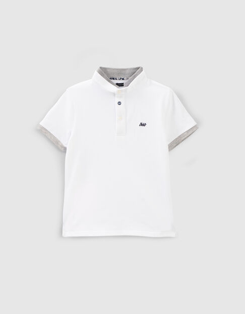Polo blanco borde acanalado gris en cuello niño