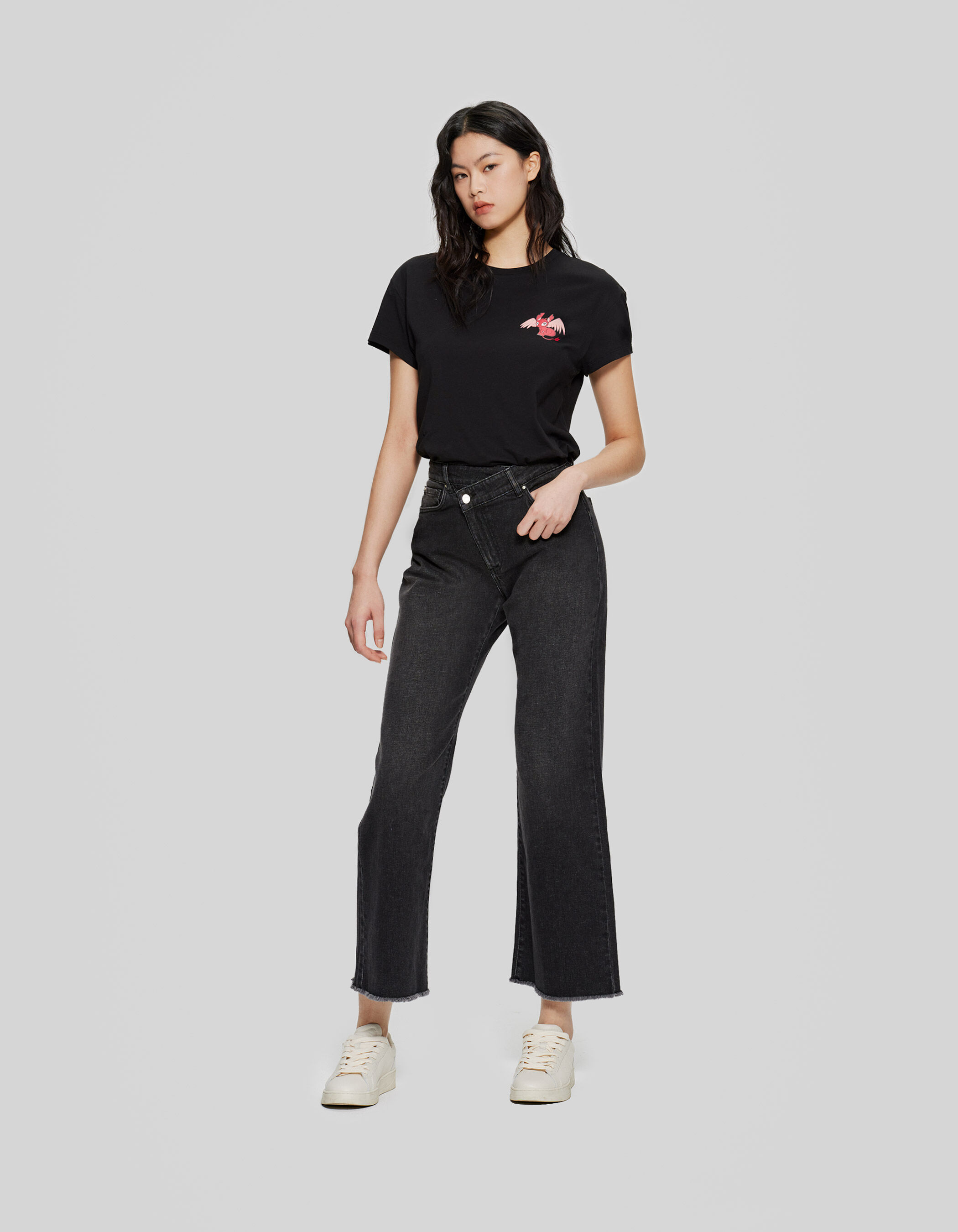 Women s medium grey jeans with asymmetric zip