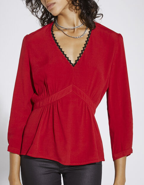 Women’s red viscose blouse with lace neckline