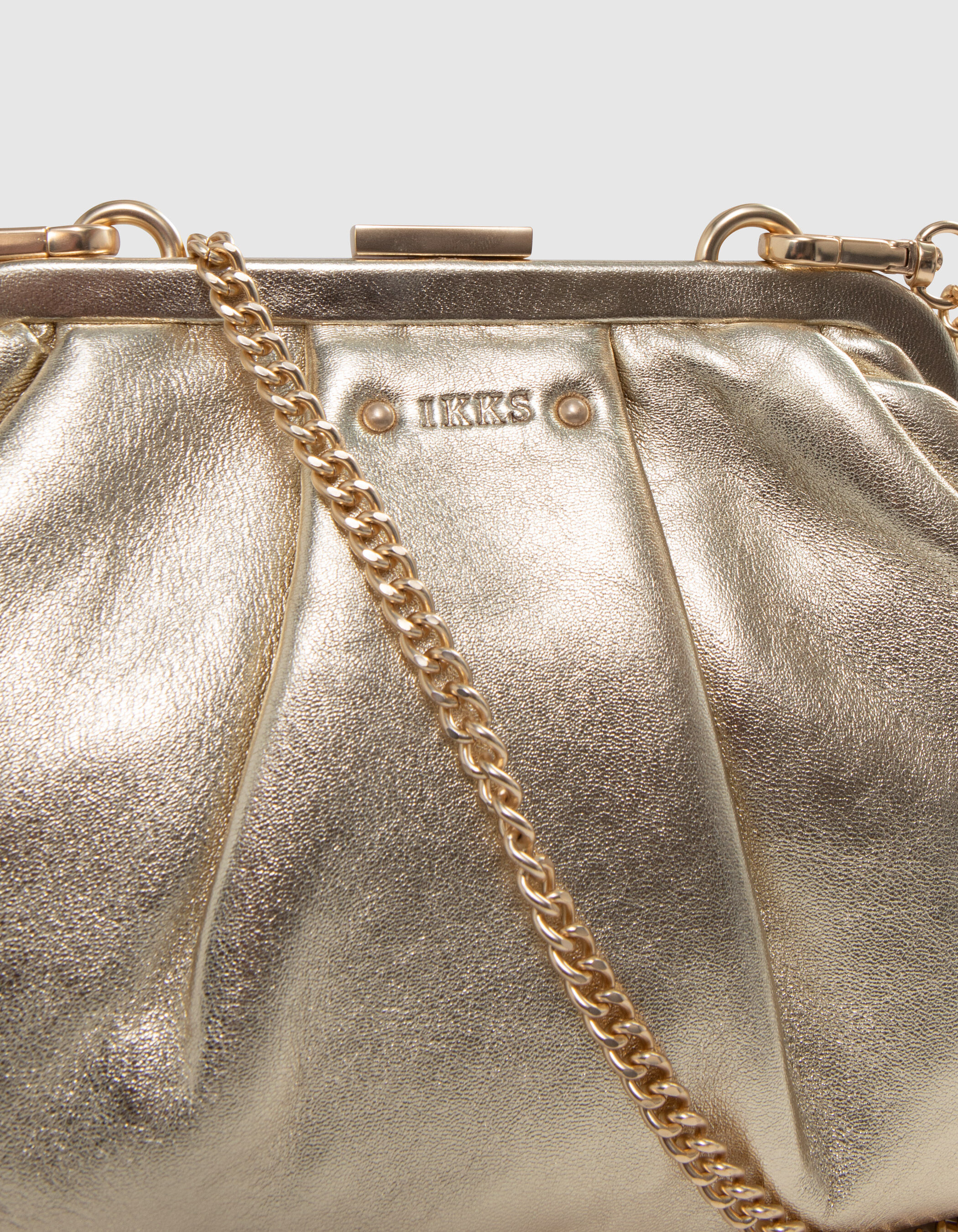 Sac bourse doré top