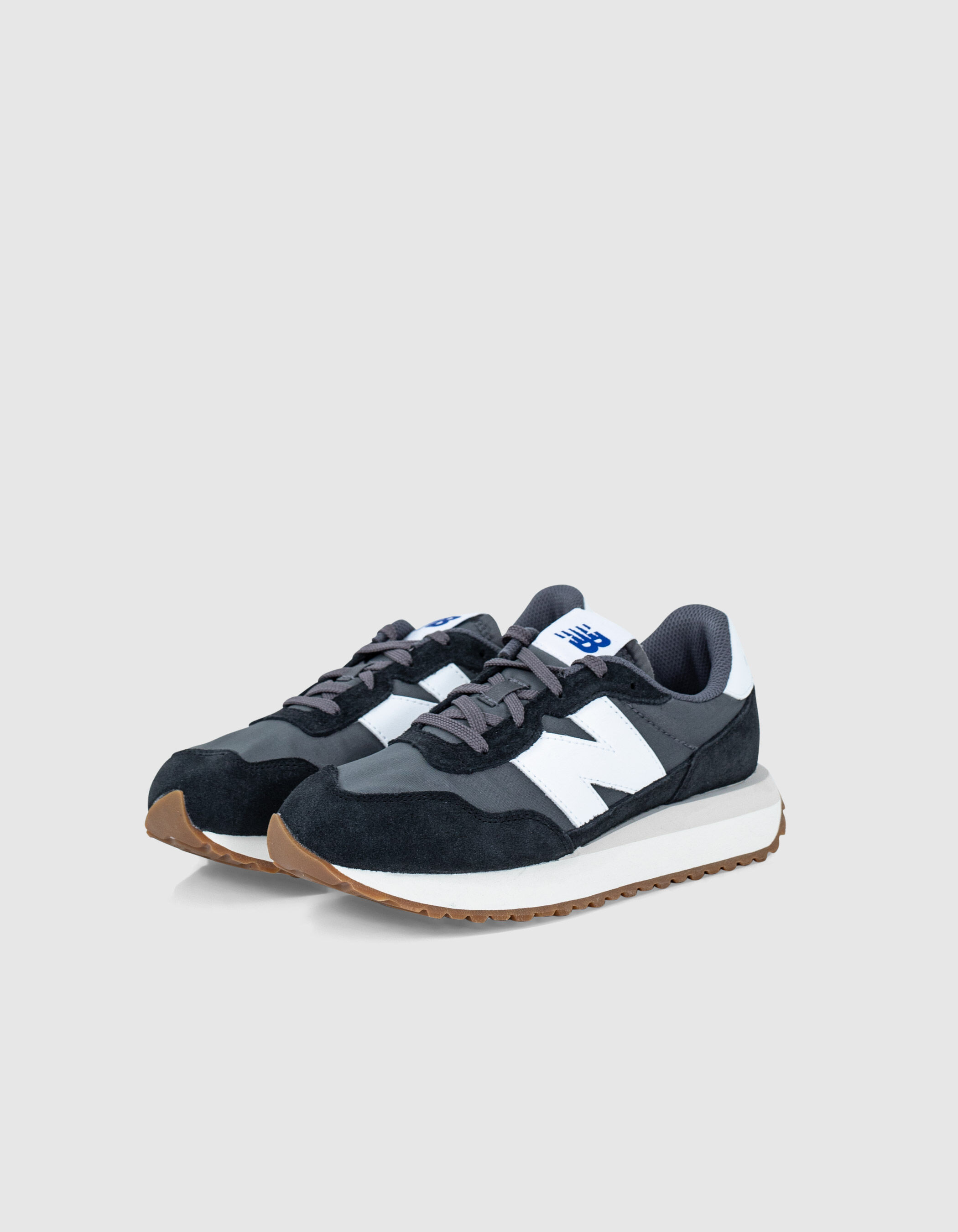 New balance negras karaoke top
